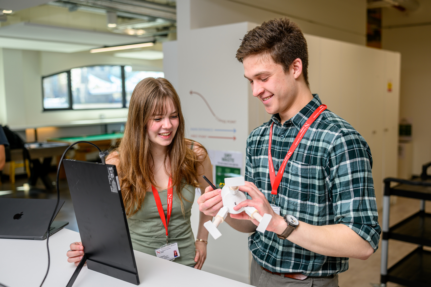 Owen Cutler and Jolie Bilodeau presenting RMEAD at London engineering showcase